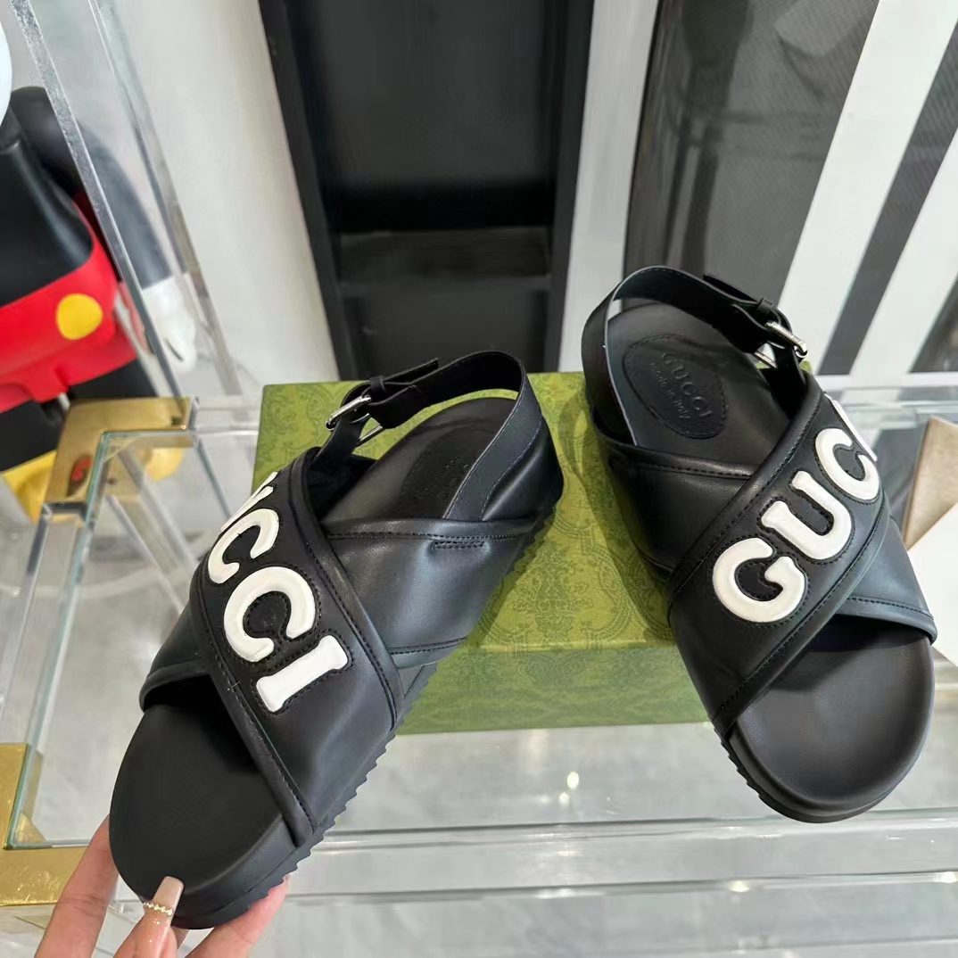 Gucci Unisex GG Gucci Sandal Smooth Black White Leather Script Rubber Buckle Flat