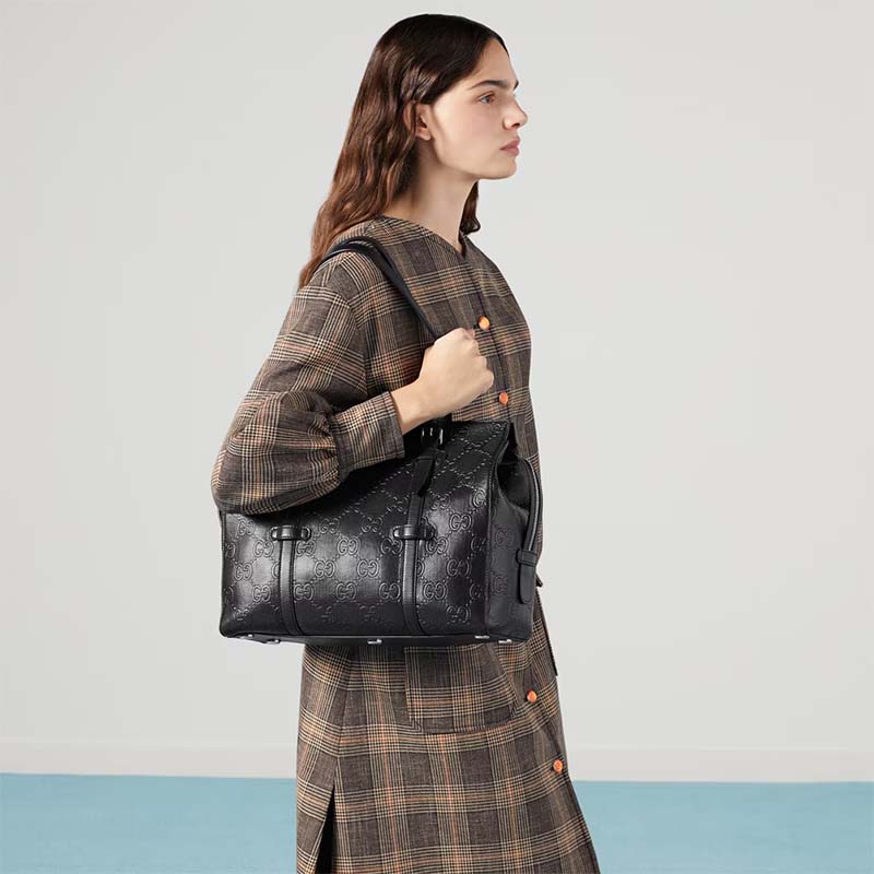 Gucci Unisex GG Embossed Tote Bag Black Leather Cotton Linen Lining
