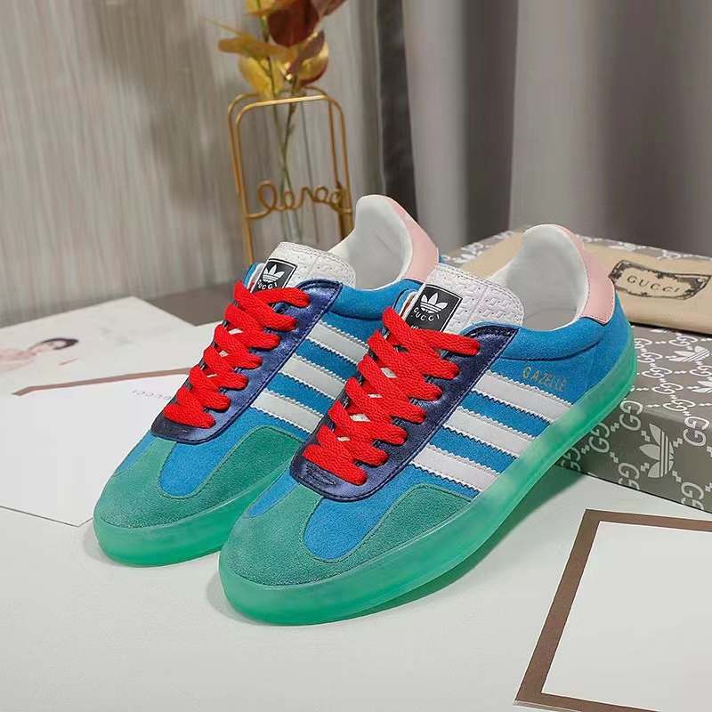 Gucci Unisex GG Adidas x Gucci Gazelle Sneaker Light Blue Silk Duchesse Demetra