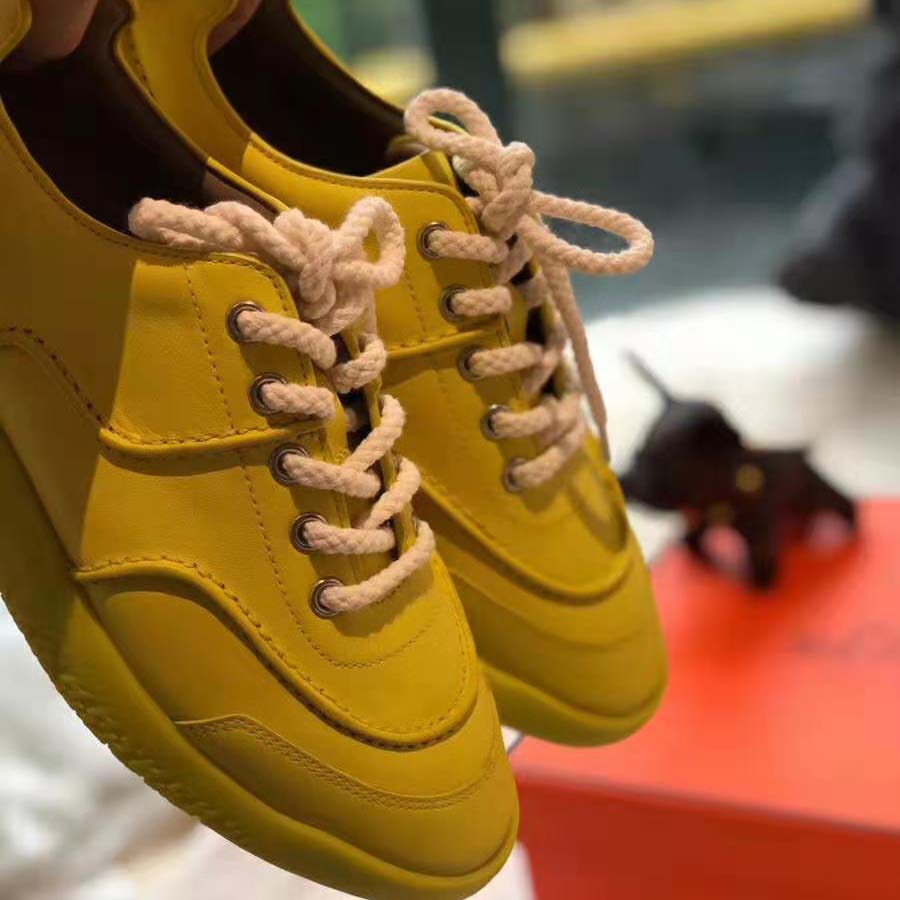 Hermes Women Turn Sneaker in Calfskin Saddle Stitch Detail-Yellow