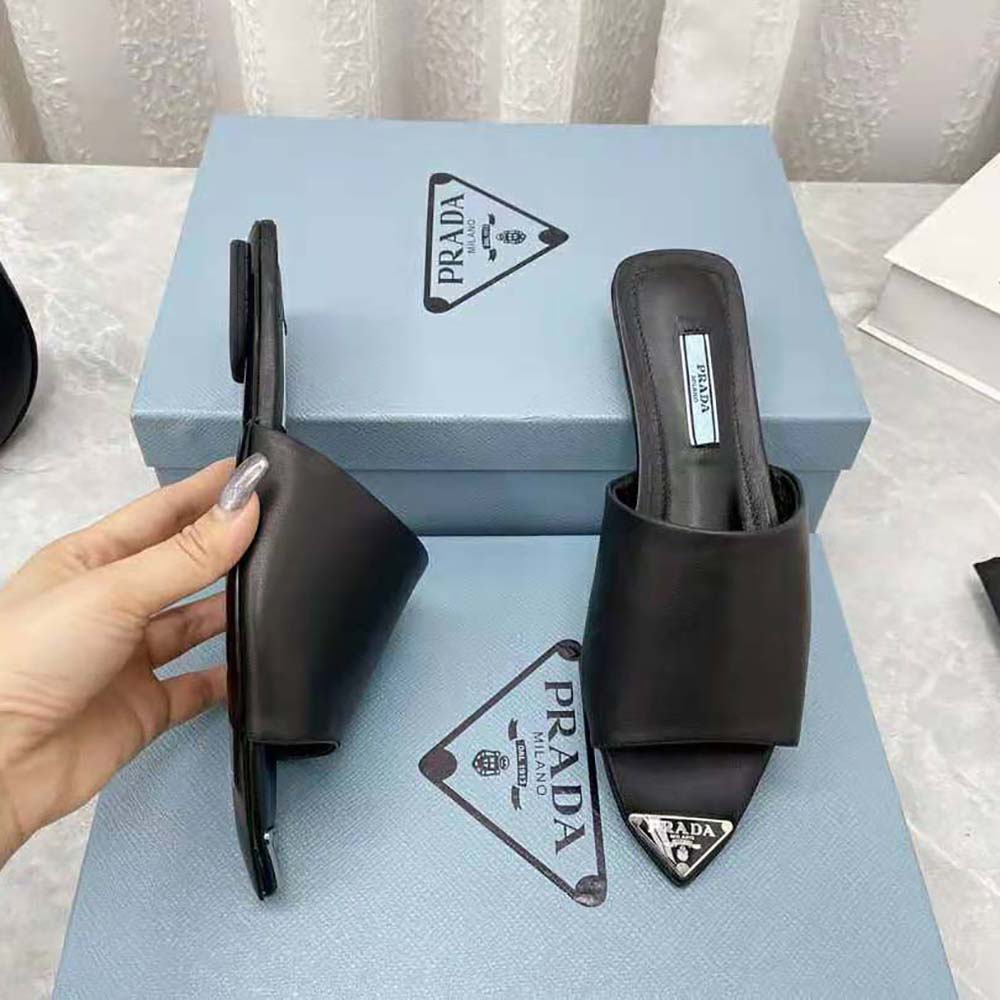 Prada Women Brushed Leather Slides with a Modernist Line Feature an Unexpected
