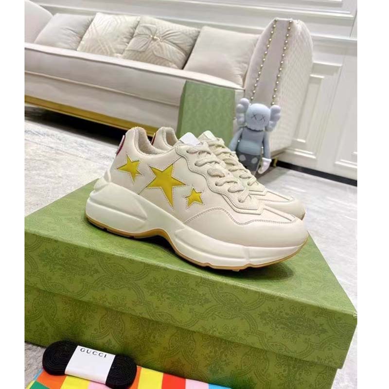 Gucci Unisex GG Rhyton Sneaker White Demetra Inlaid Interlocking G Stars Rubber Low Heel