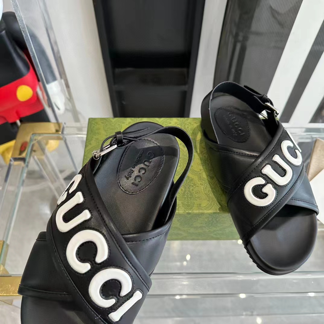 Gucci Unisex GG Gucci Sandal Smooth Black White Leather Script Rubber Buckle Flat