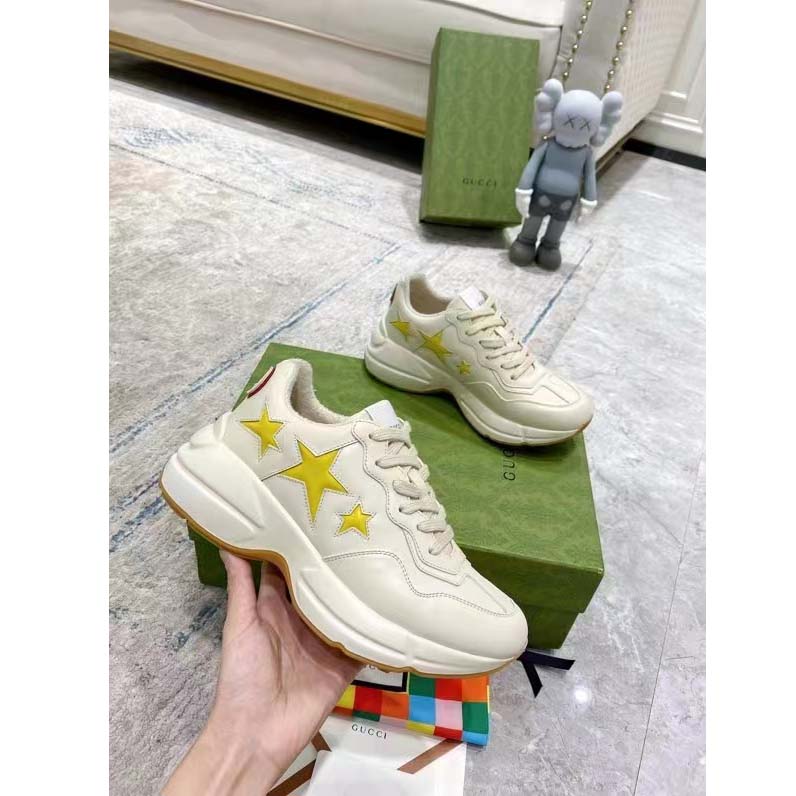 Gucci Unisex GG Rhyton Sneaker White Demetra Inlaid Interlocking G Stars Rubber Low Heel