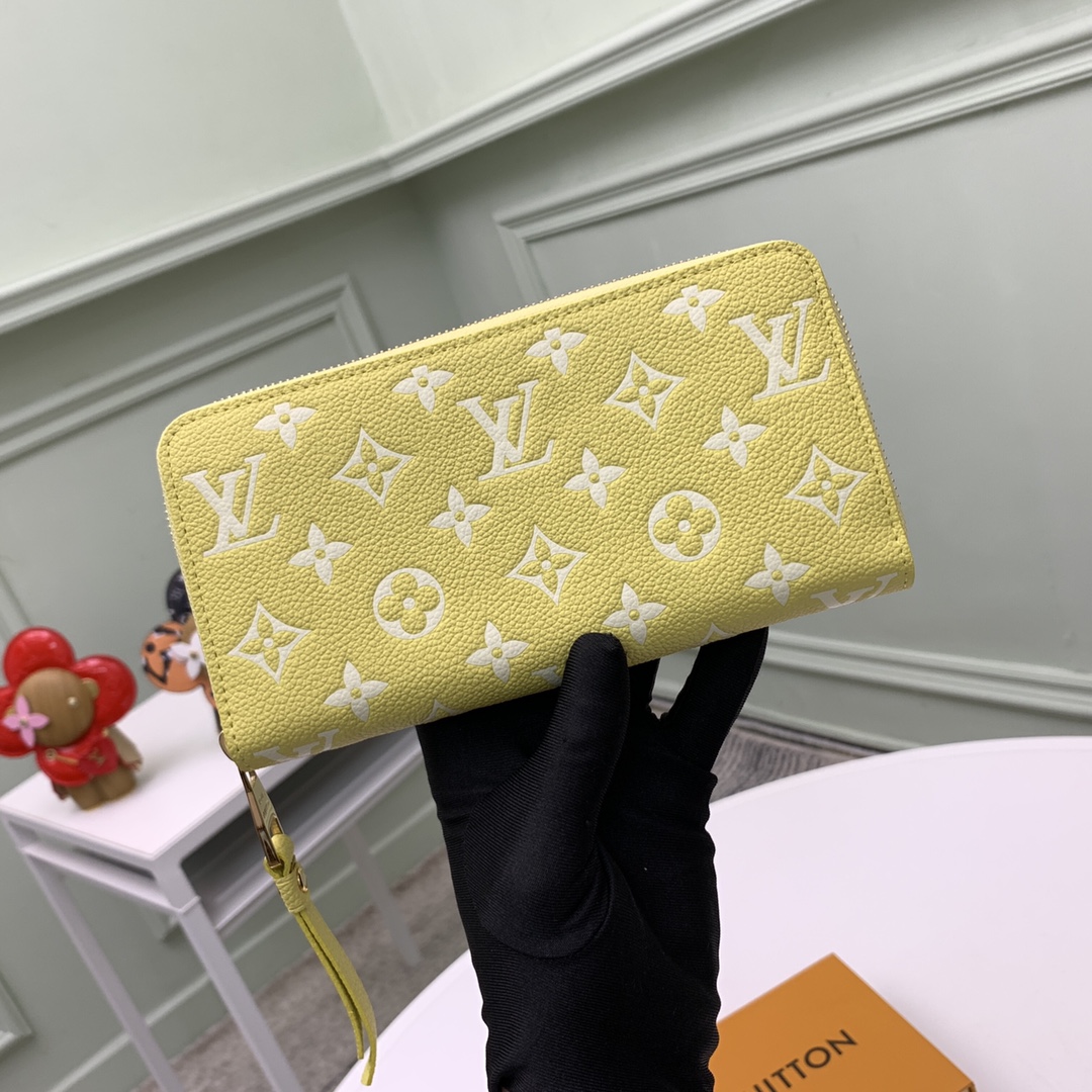 Louis Vuitton LV Unisex Zippy Wallet Yellow Monogram Empreinte Embossed Supple Grained Cowhide