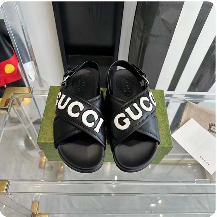 Gucci Unisex GG Gucci Sandal Smooth Black White Leather Script Rubber Buckle Flat