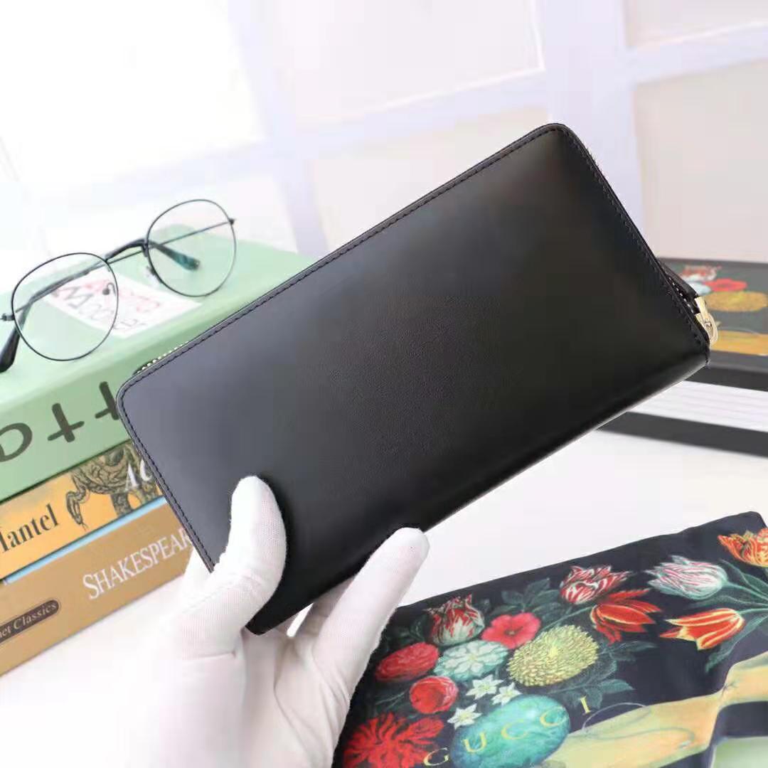 Gucci GG Unisex Leather Zip Around Wallet with Gucci Logo in Black Leather