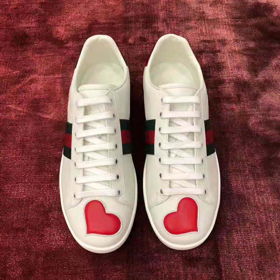 Gucci Women’s Ace Embroidered Sneaker with Two Leather Hearts in Rubber Sole-White
