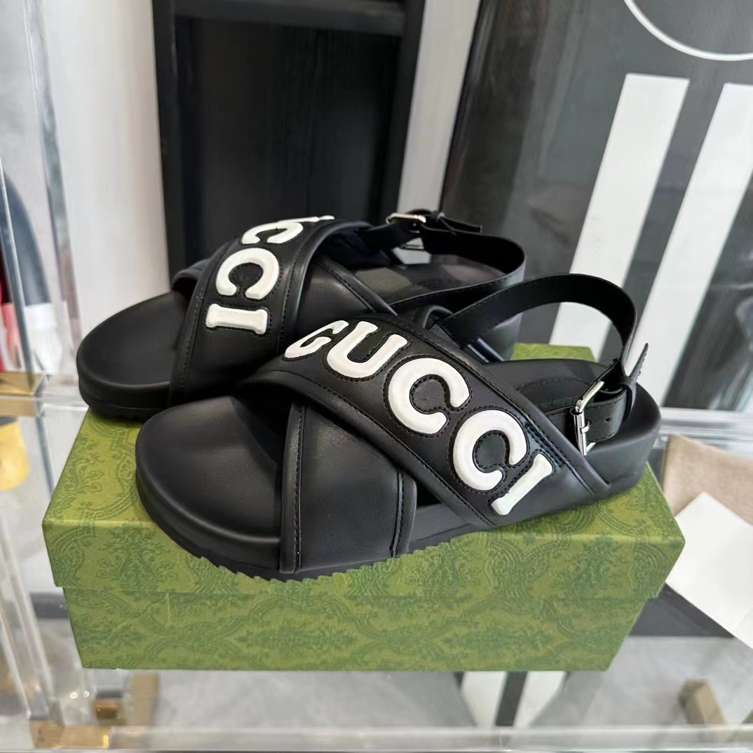 Gucci Unisex GG Gucci Sandal Smooth Black White Leather Script Rubber Buckle Flat