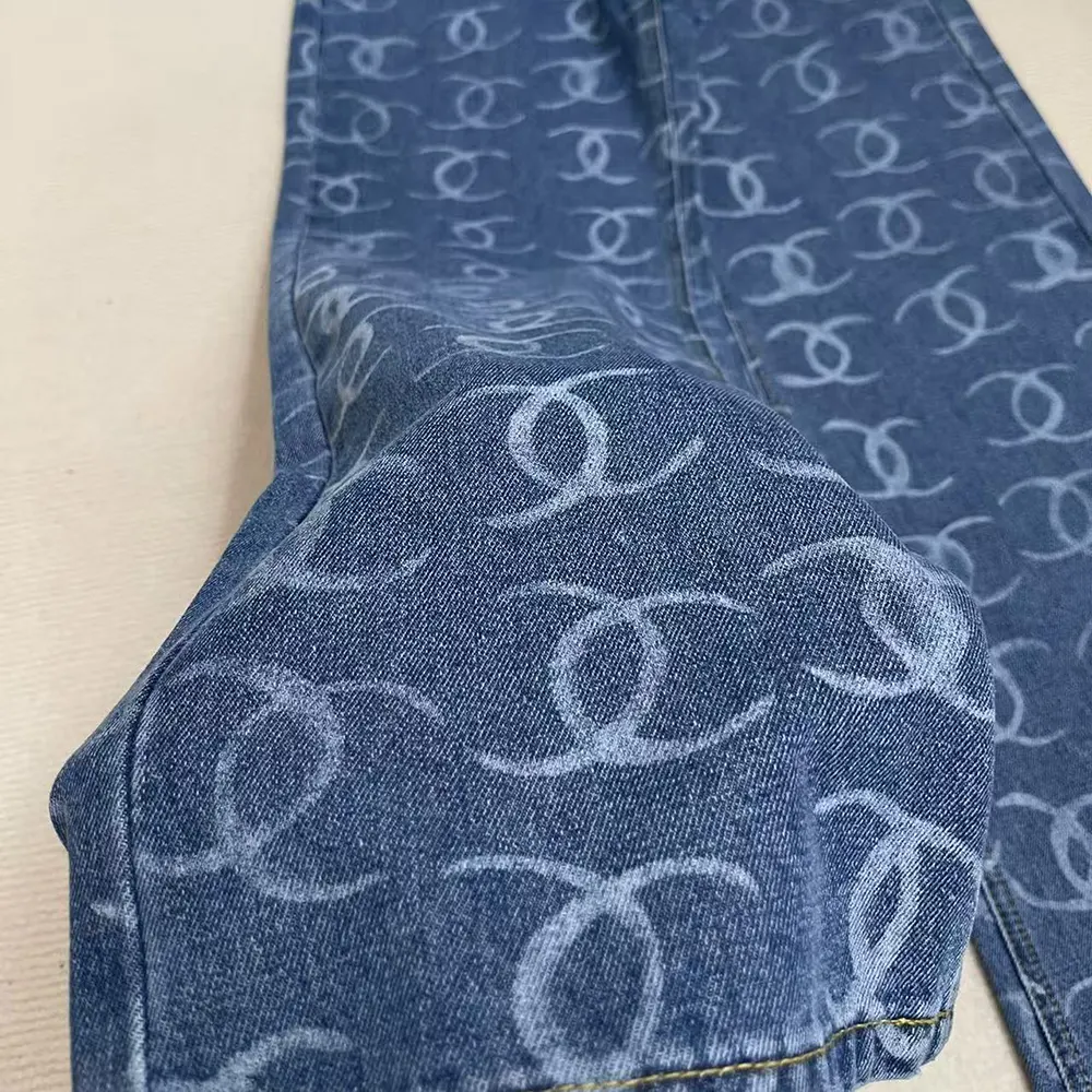 Chanel Women CC Jeans Flared Jeans in Washed Denim