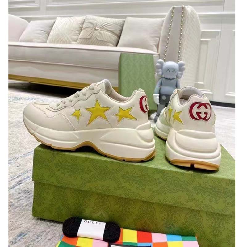 Gucci Unisex GG Rhyton Sneaker White Demetra Inlaid Interlocking G Stars Rubber Low Heel