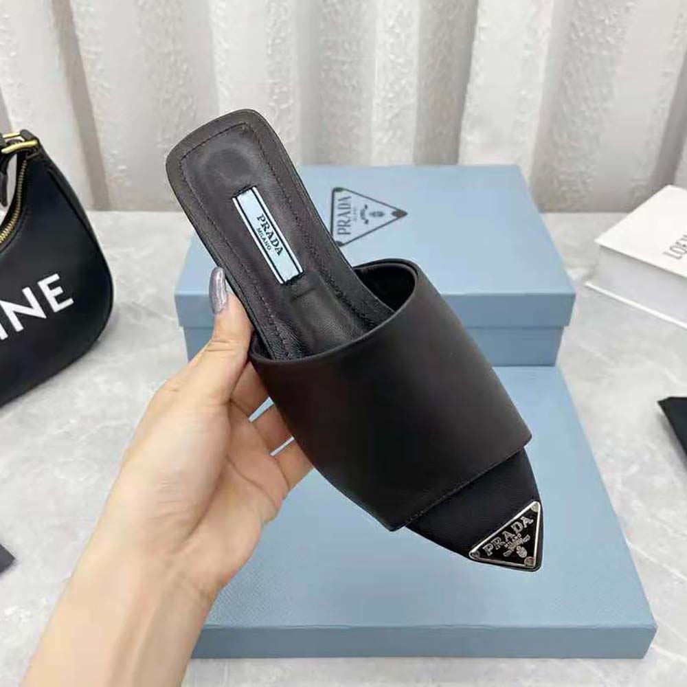 Prada Women Brushed Leather Slides with a Modernist Line Feature an Unexpected