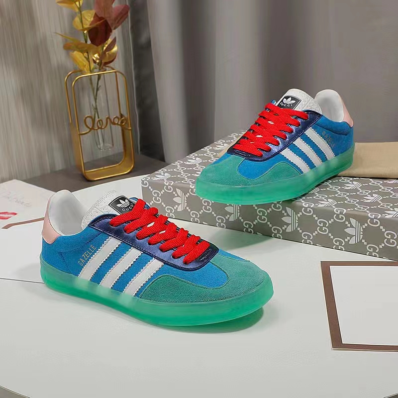 Gucci Unisex GG Adidas x Gucci Gazelle Sneaker Light Blue Silk Duchesse Demetra