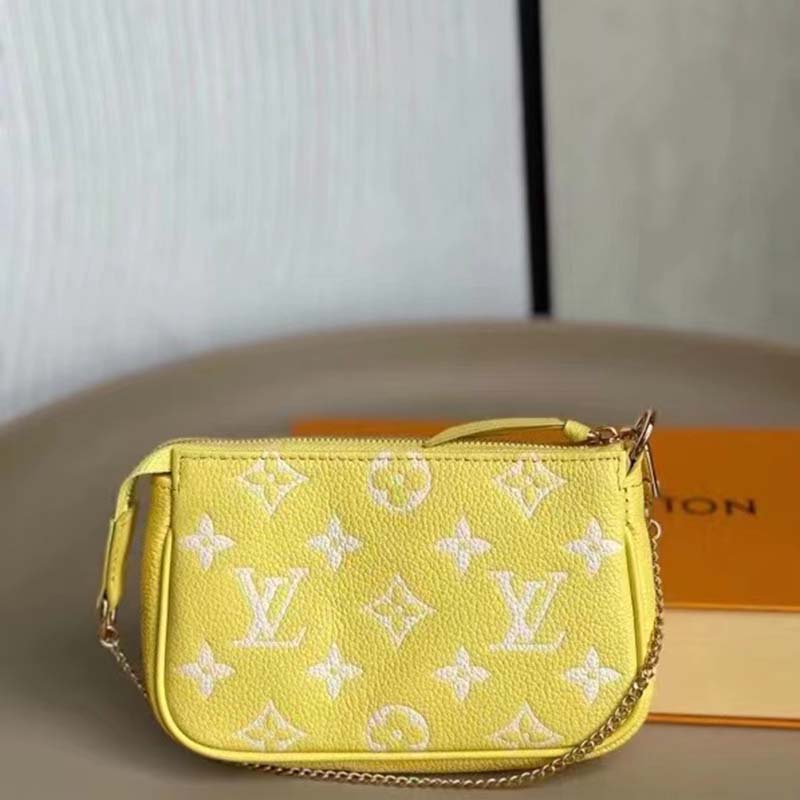 Louis Vuitton LV Women Mini Pochette Accessoires Yellow Monogram Empreinte Embossed Supple Grained Cowhide
