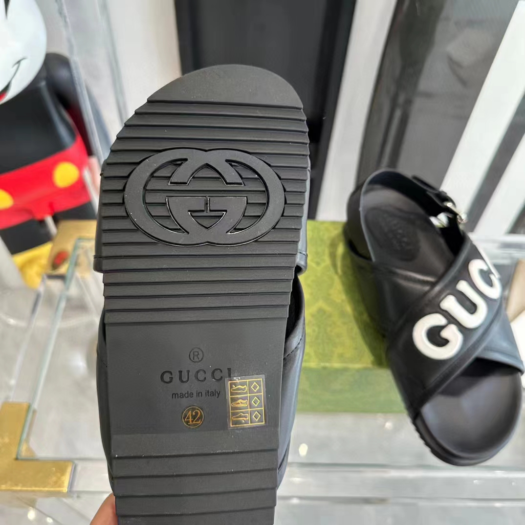 Gucci Unisex GG Gucci Sandal Smooth Black White Leather Script Rubber Buckle Flat