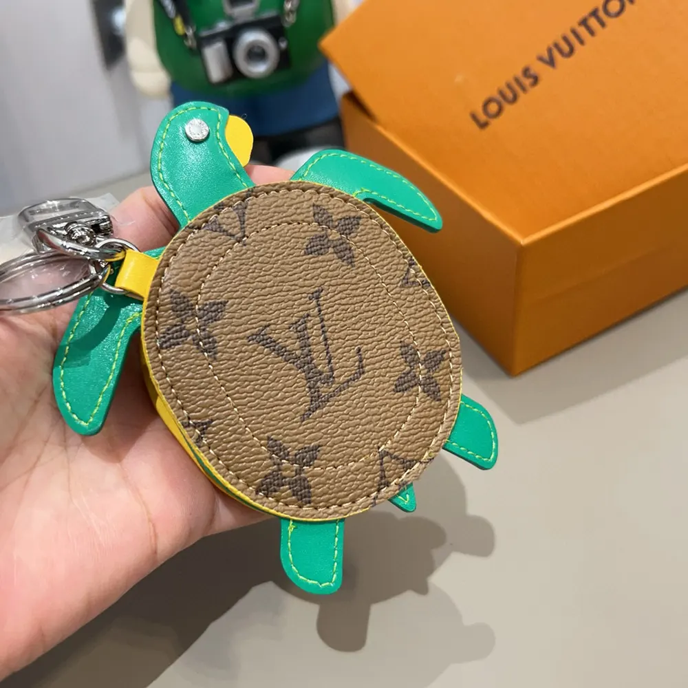 Louis Vuitton LV Women LV Turtle Pouch Bag Charm-Brown M01471