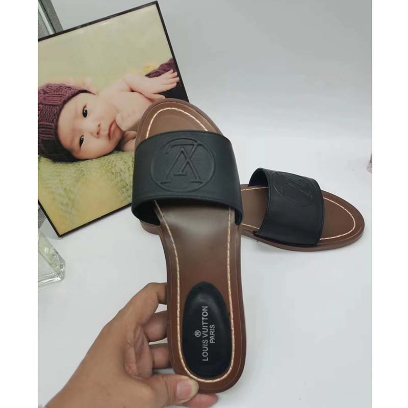 Louis Vuitton LV Women Lock It Flat Mule Black Grained Calf Leather