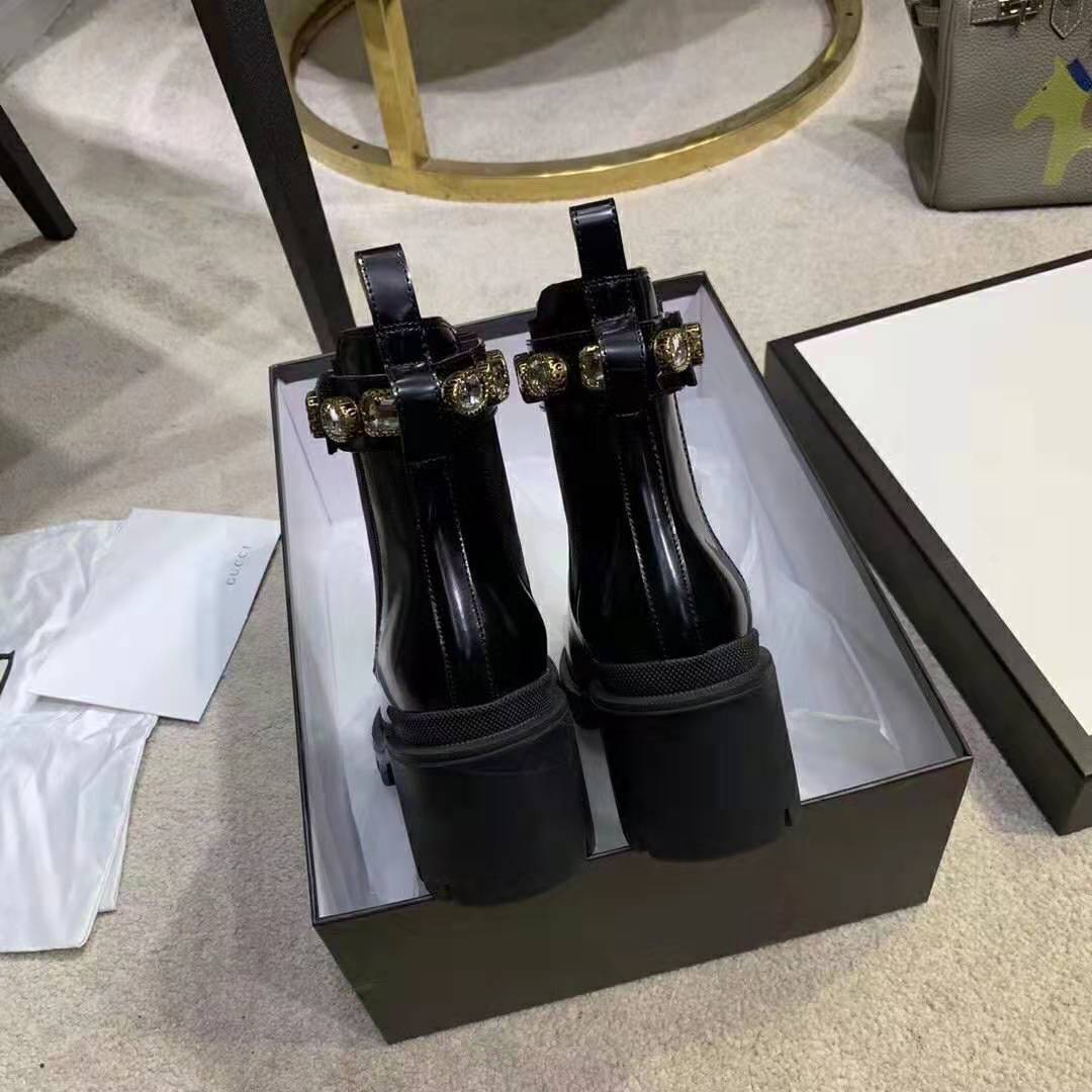 Gucci Women Leather Ankle Boot with Belt 6 cm Heel in Black Shiny Leather