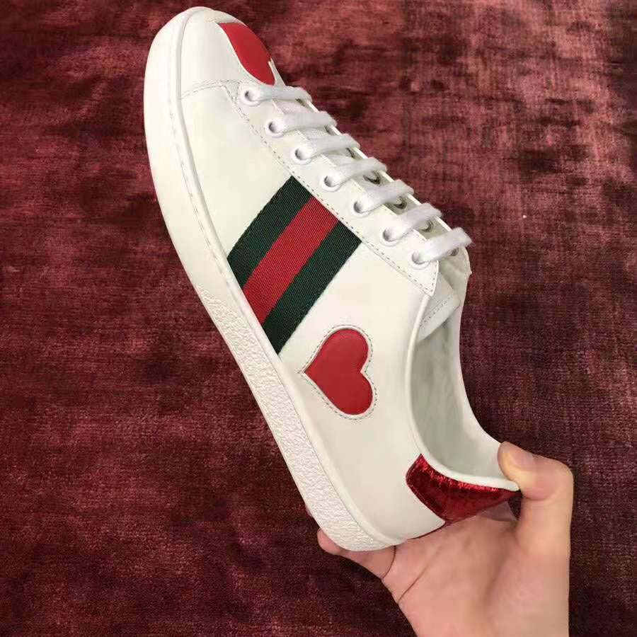 Gucci Women’s Ace Embroidered Sneaker with Two Leather Hearts in Rubber Sole-White
