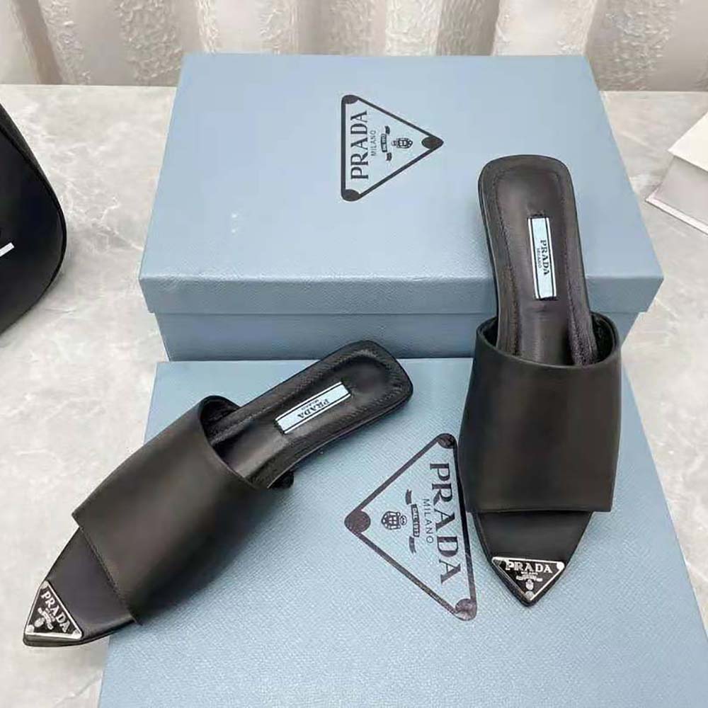 Prada Women Brushed Leather Slides with a Modernist Line Feature an Unexpected