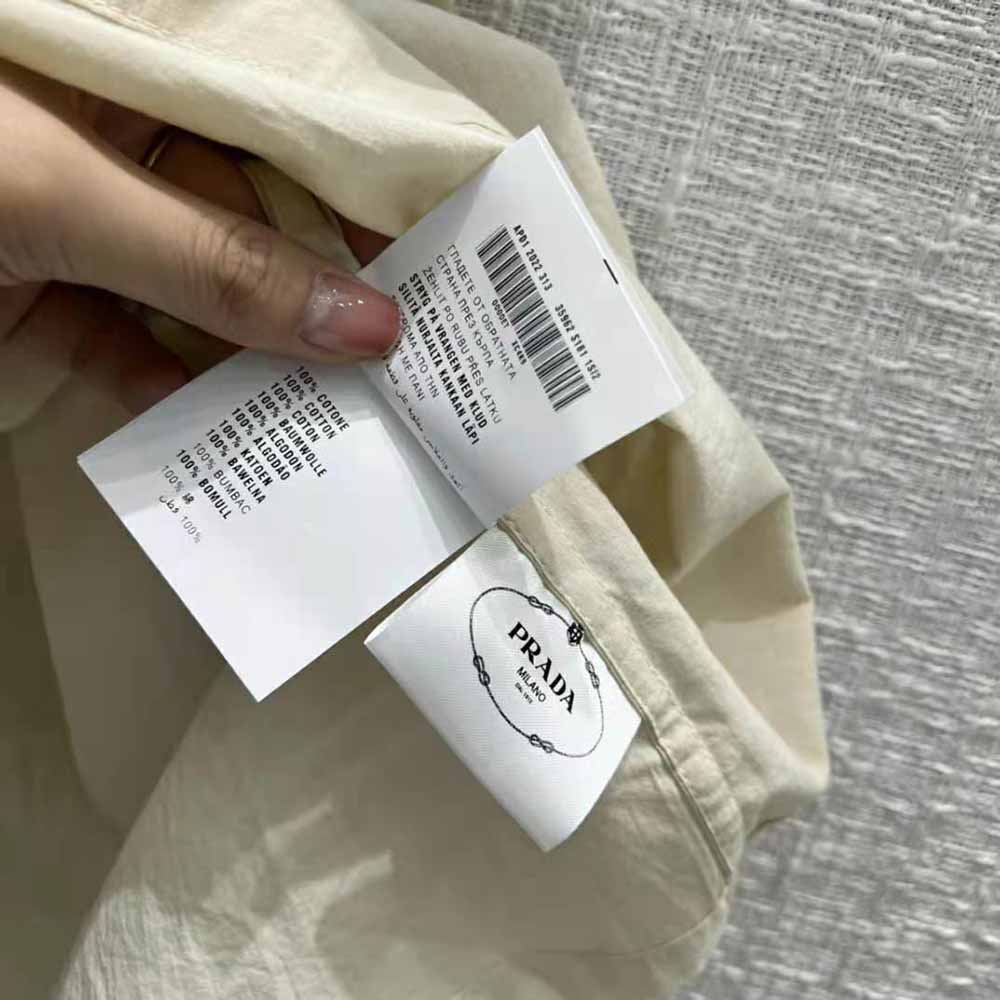 Prada Women Printed Canvas Dress is Decorated with Motifs Made