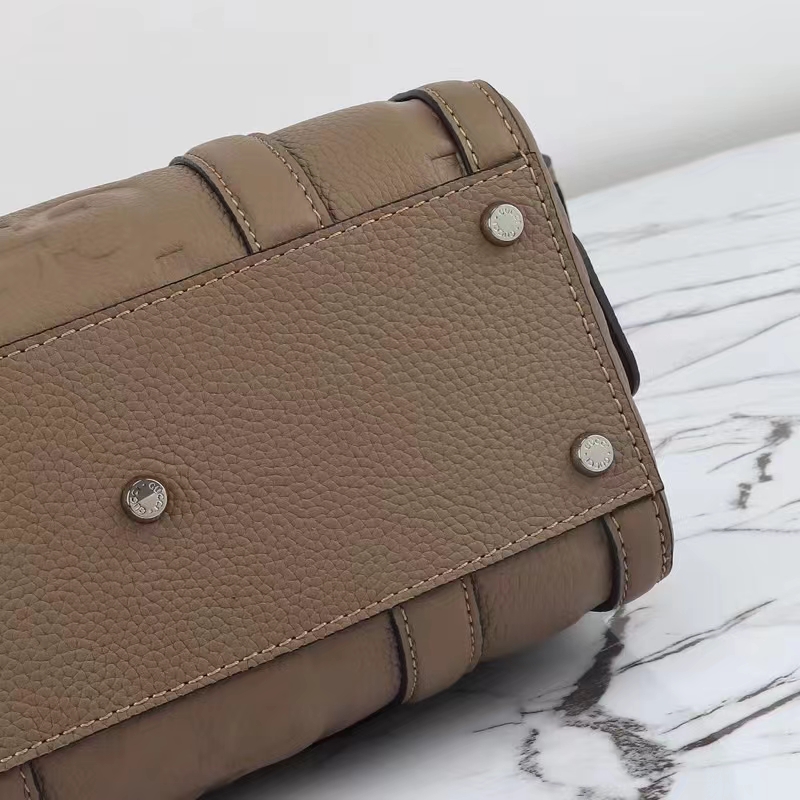 Gucci Unisex Jumbo GG Mini Duffle Bag Taupe Leather Double G Zip Closure