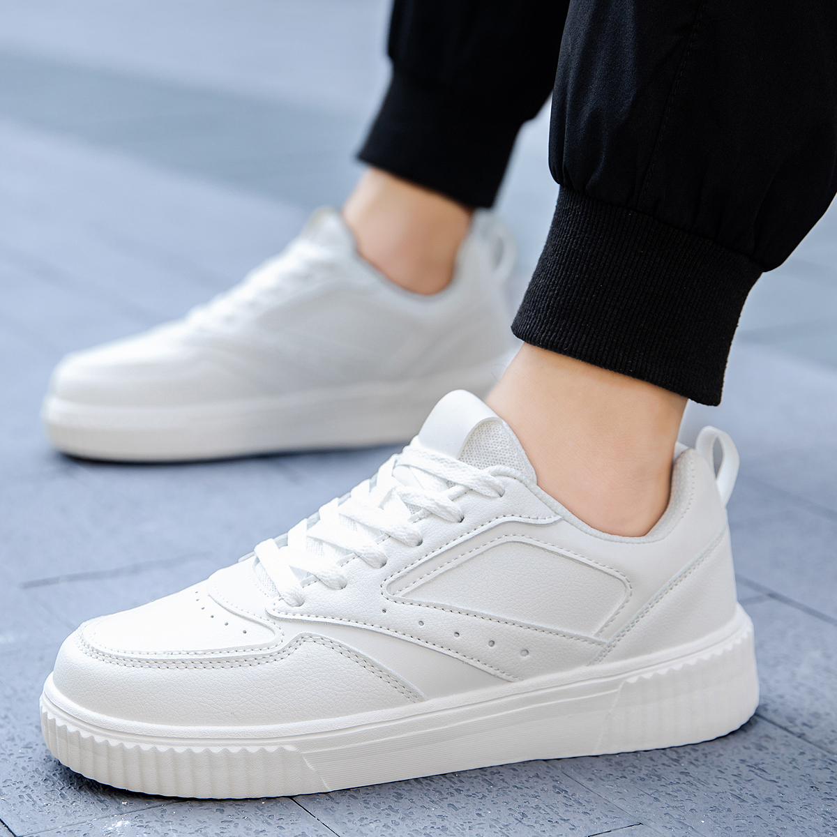 OEM Design Simple Trendy Men and Women Sport Casual Shoes High Quality Solid Color White Student Skate Shoes
